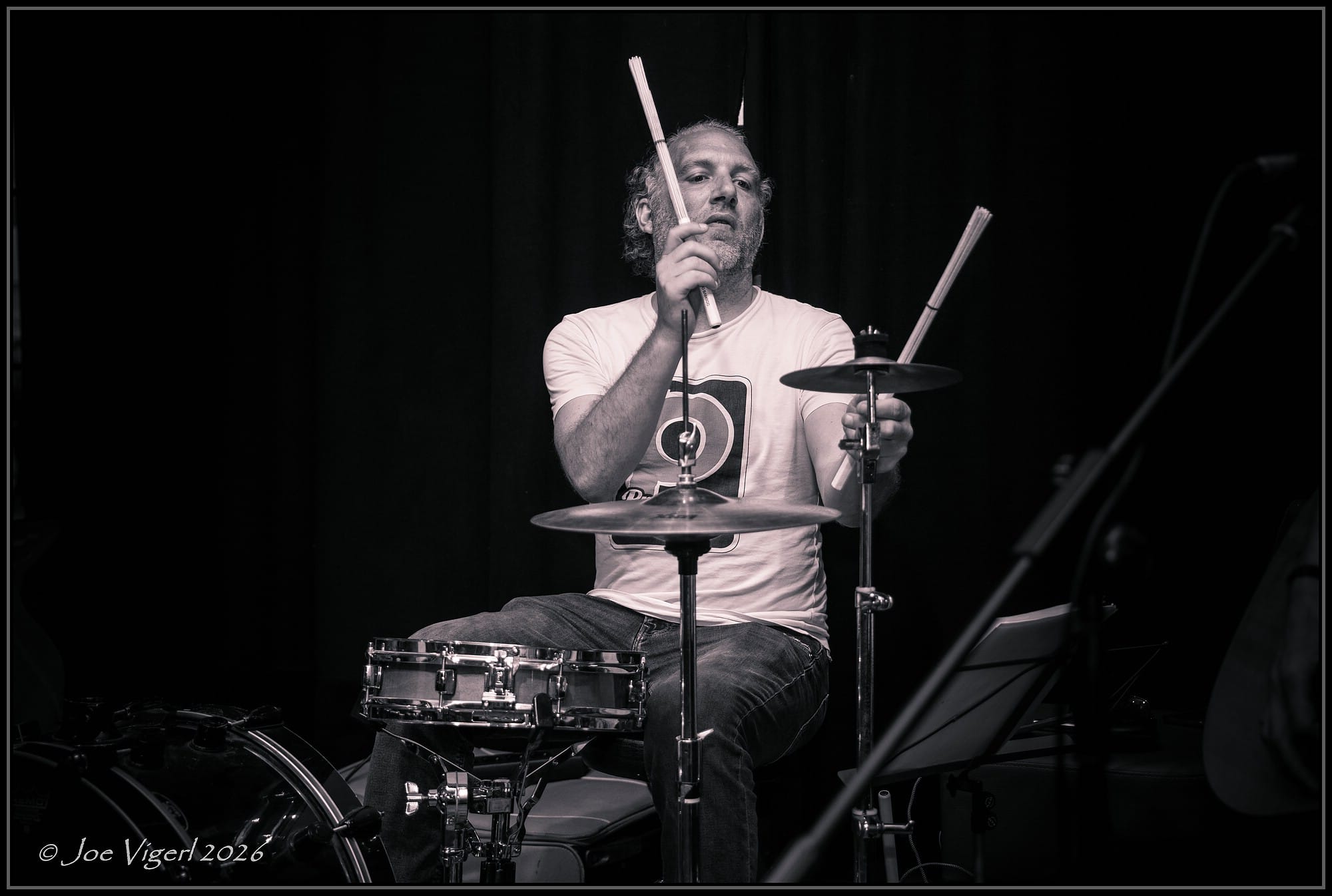 Drummer keeping the beat with brushes